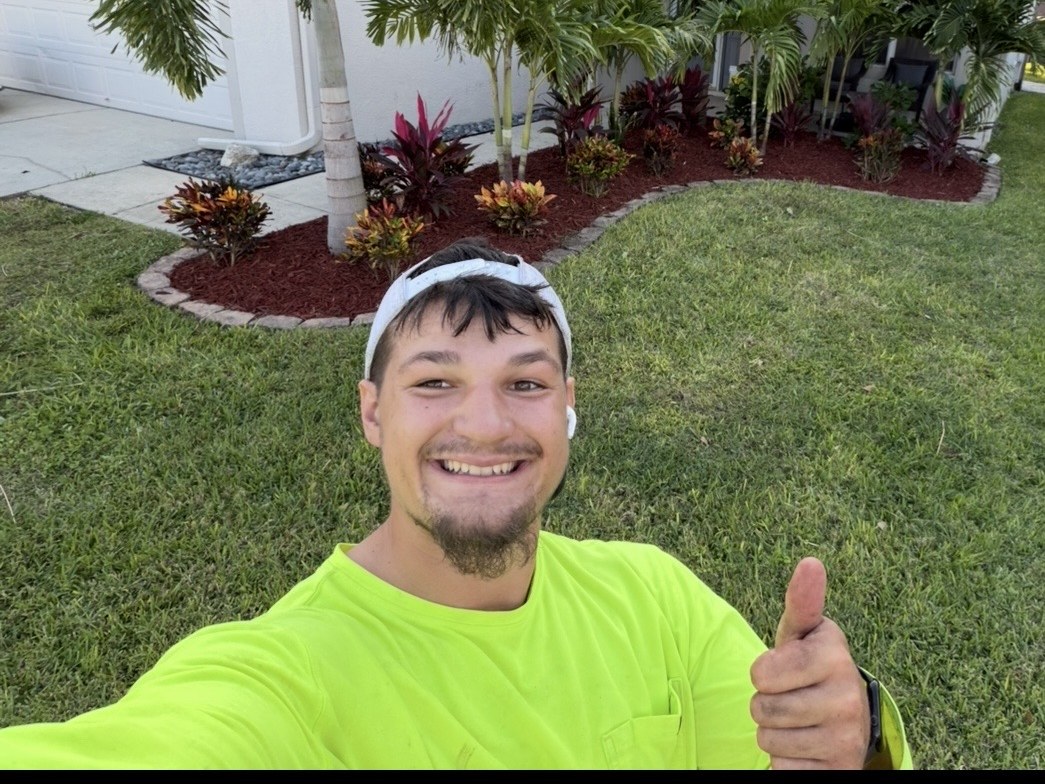 Jacob Wells at a finished landscaping job in New Port Richey